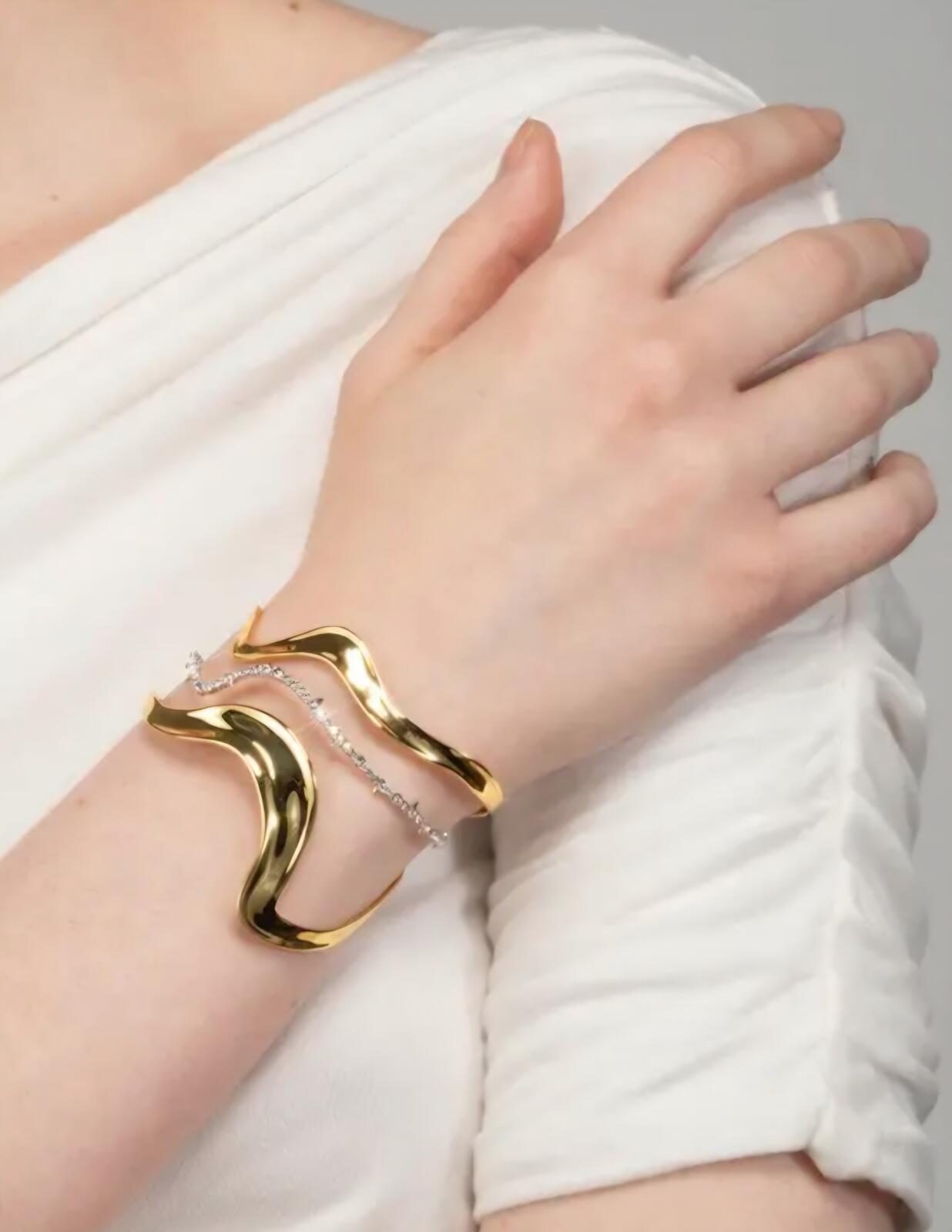 Modern Gold Tone Wave Cuff Bracelet with Silver Chain Accent