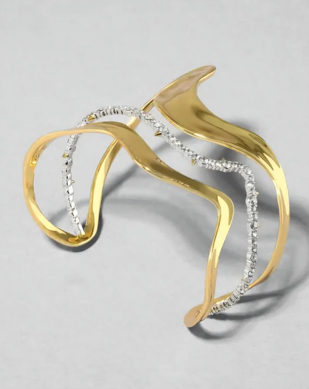 Modern Gold Tone Wave Cuff Bracelet with Silver Chain Accent